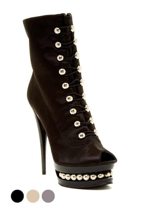 Black satin ankle boot with a peep toe, 6-inch shaft, 4-inch platform, and silver-tone decorative lacing.